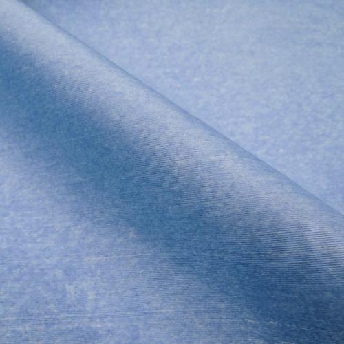 Creped woodpulp/polyester nonwoven fabric